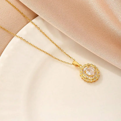 Women's gold electroplated copper necklace showing four pendant options: heart, butterfly, cross and round diamond