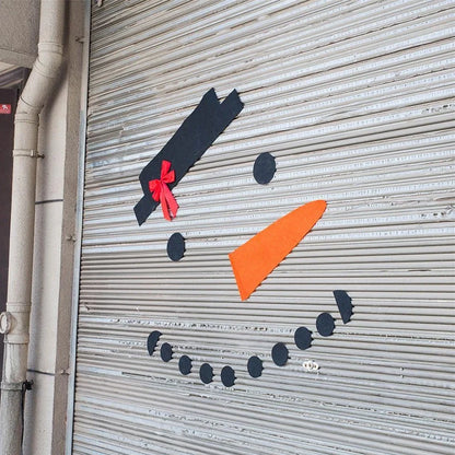 DIY snowman decoration kit with 16 components including hat, bow, and foam shapes on non-woven fabric