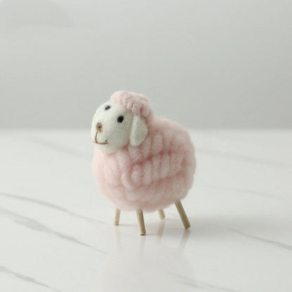 Adorable plush sheep decorations in various sizes and color combinations, perfect for adding a cozy, farmhouse-inspired touch to any home.