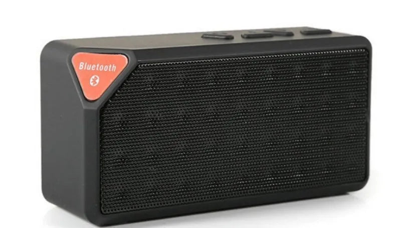 Cannon X3 small cube-shaped wireless Bluetooth speaker in five colour options on a plain background.