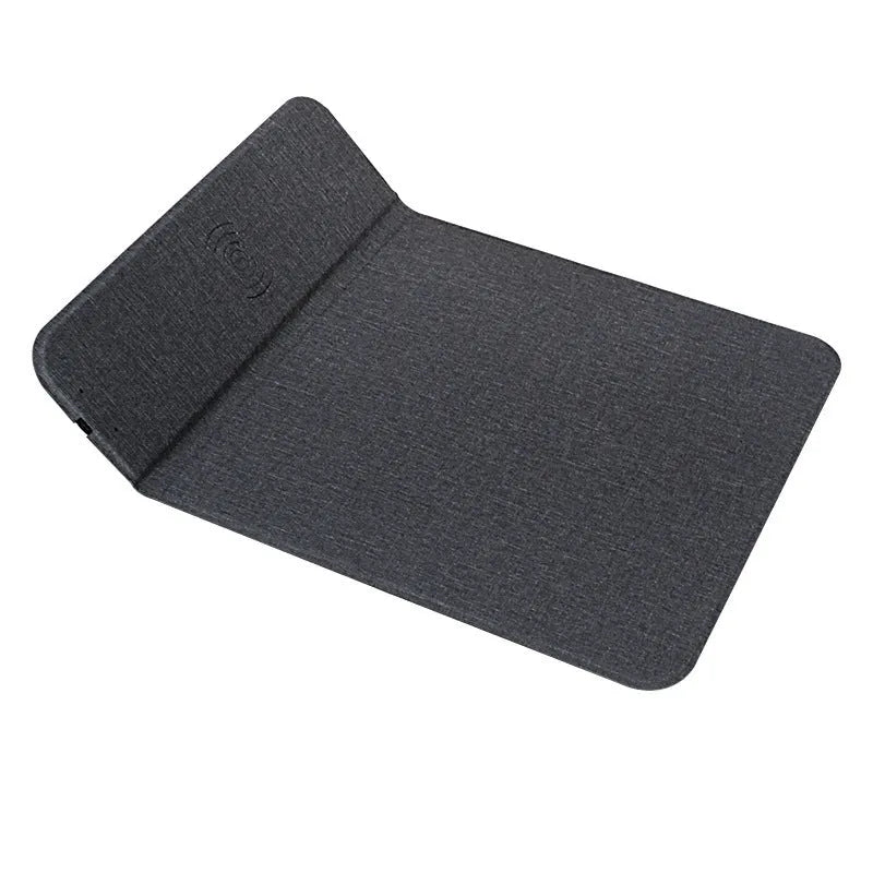Foldable cloth wireless phone holder charging a smartphone, showing compact storage design