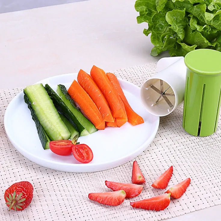 White plastic vegetable and fruit slicer with six stainless steel blades for cutting cucumbers and carrots.