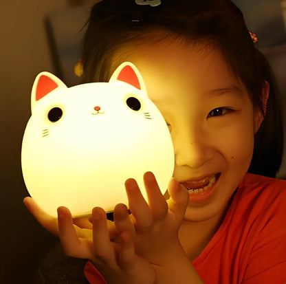 Cute cat-shaped silicone LED lamp with warm white and colourful lighting, measuring 12.5cm