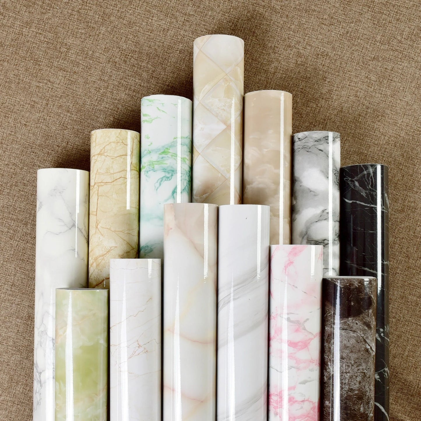 Premium peel-and-stick marble-look wall panels in various colors and sizes for kitchen and bathroom renovations