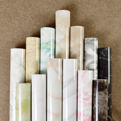 Premium peel-and-stick marble-look wall panels in various colors and sizes for kitchen and bathroom renovations