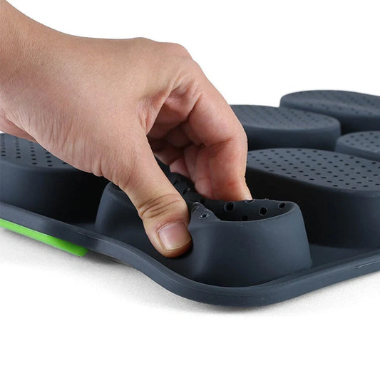 Dark grey silicone bread baking mould with eight compartments for uniform French loaves