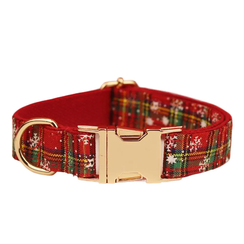 Red snowflake plaid Christmas dog collar and leash set with matching floral vest and bow accessory