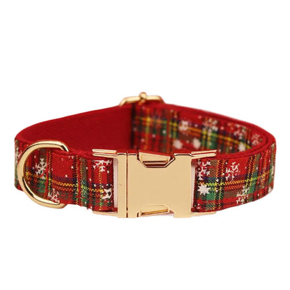 Red snowflake plaid Christmas dog collar and leash set with matching floral vest and bow accessory