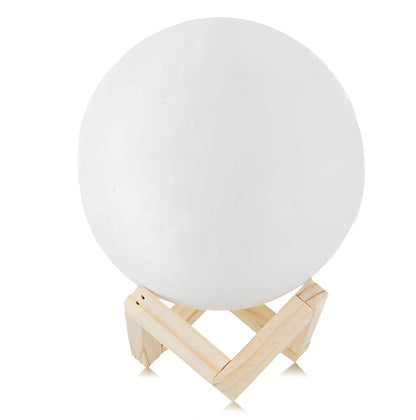 3D printed moon night light with detailed lunar surface and dual-colour LED lighting on beech wood stand