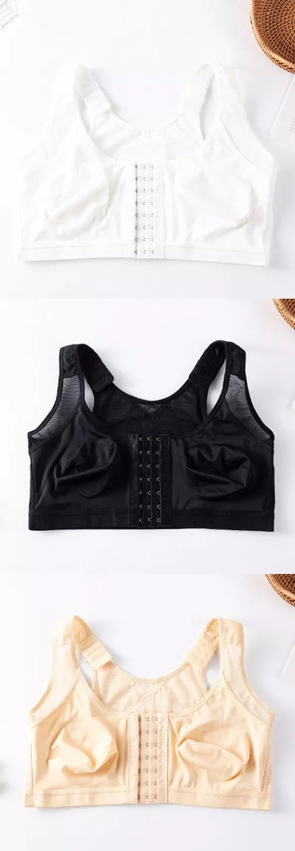 Plus-size front buckle sports bra in white, black, and apricot