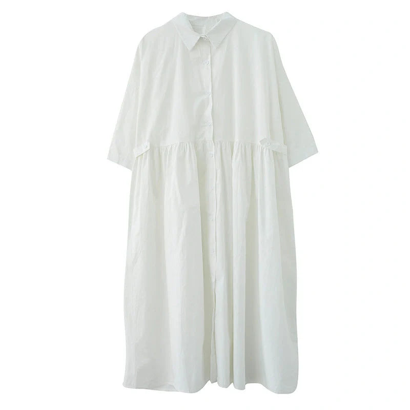 Chic casual loose dress in white and black colors with polo collar and short sleeves, made of premium linen fabric for a relaxed and comfortable fit
