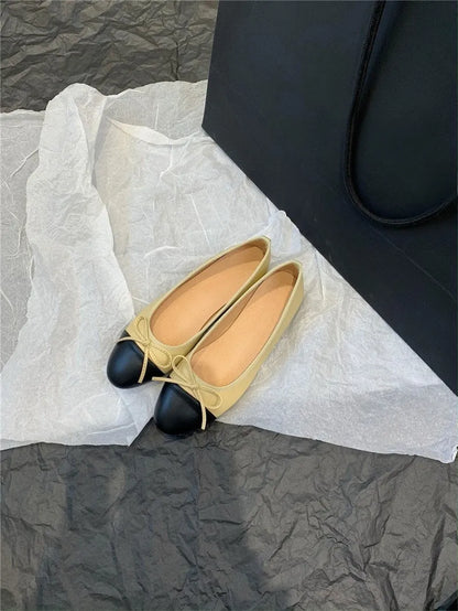 Ballet flat shoes with bowknot decoration and soft rubber soles in apricot colour