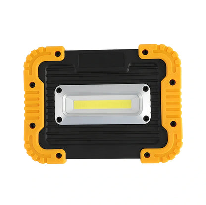 LED camping lantern with rotatable support showing USB ports and battery indicator lights