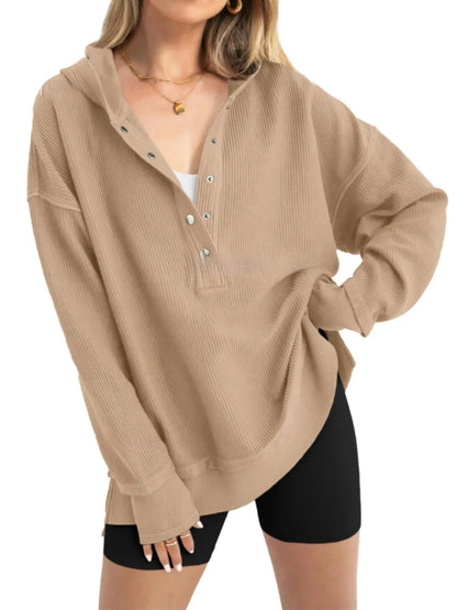 Women's loose raglan sleeve sweater in peacock green colour, showing long sleeves and casual pullover style