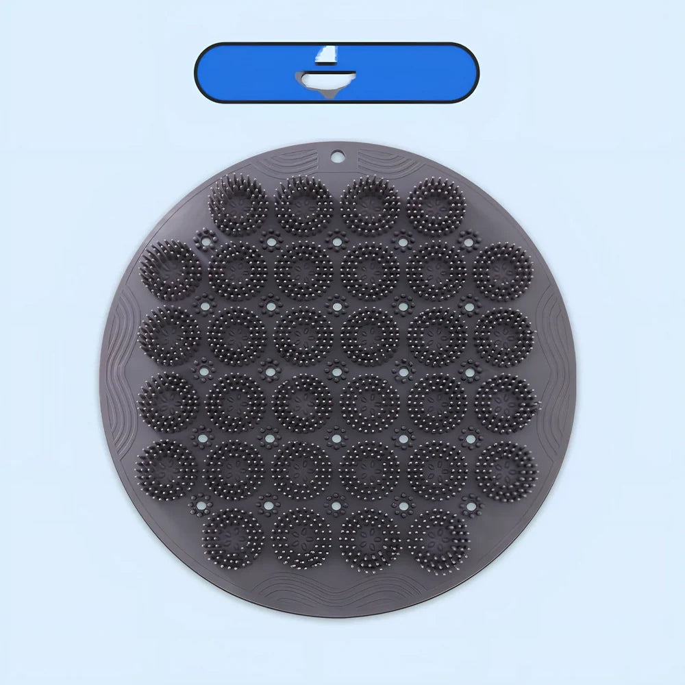 Sky blue silicone back bath brush with suction cups measuring 30x30cm