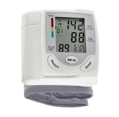 Grey wrist blood pressure monitor with compact design and digital display