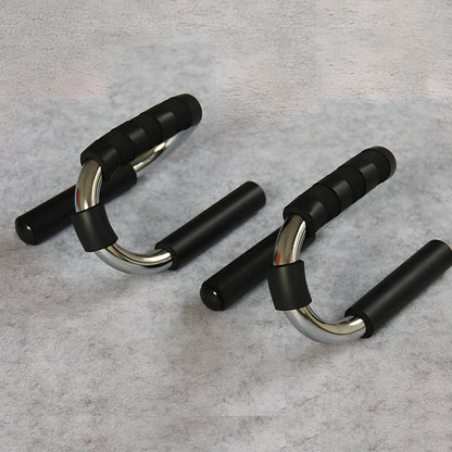 Green suction cup push-up bracket with electroplated steel frame and foam handles for chest exercises