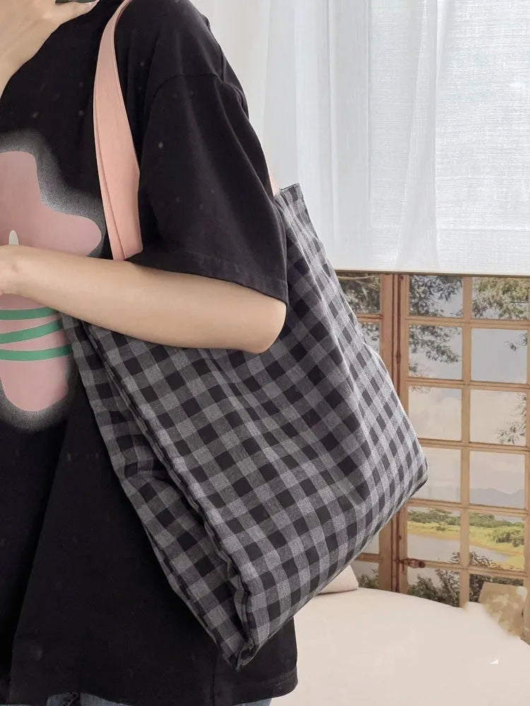 Light pink striped cotton canvas multi-layer tote bag with a wide shoulder strap.