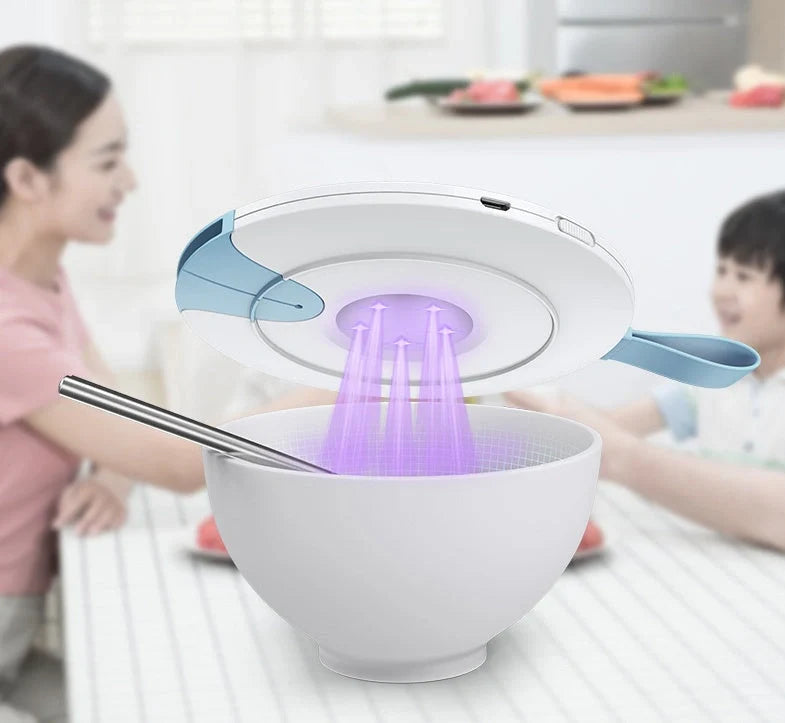 Compact USB-powered baby bottle sterilizer in blue and pink options