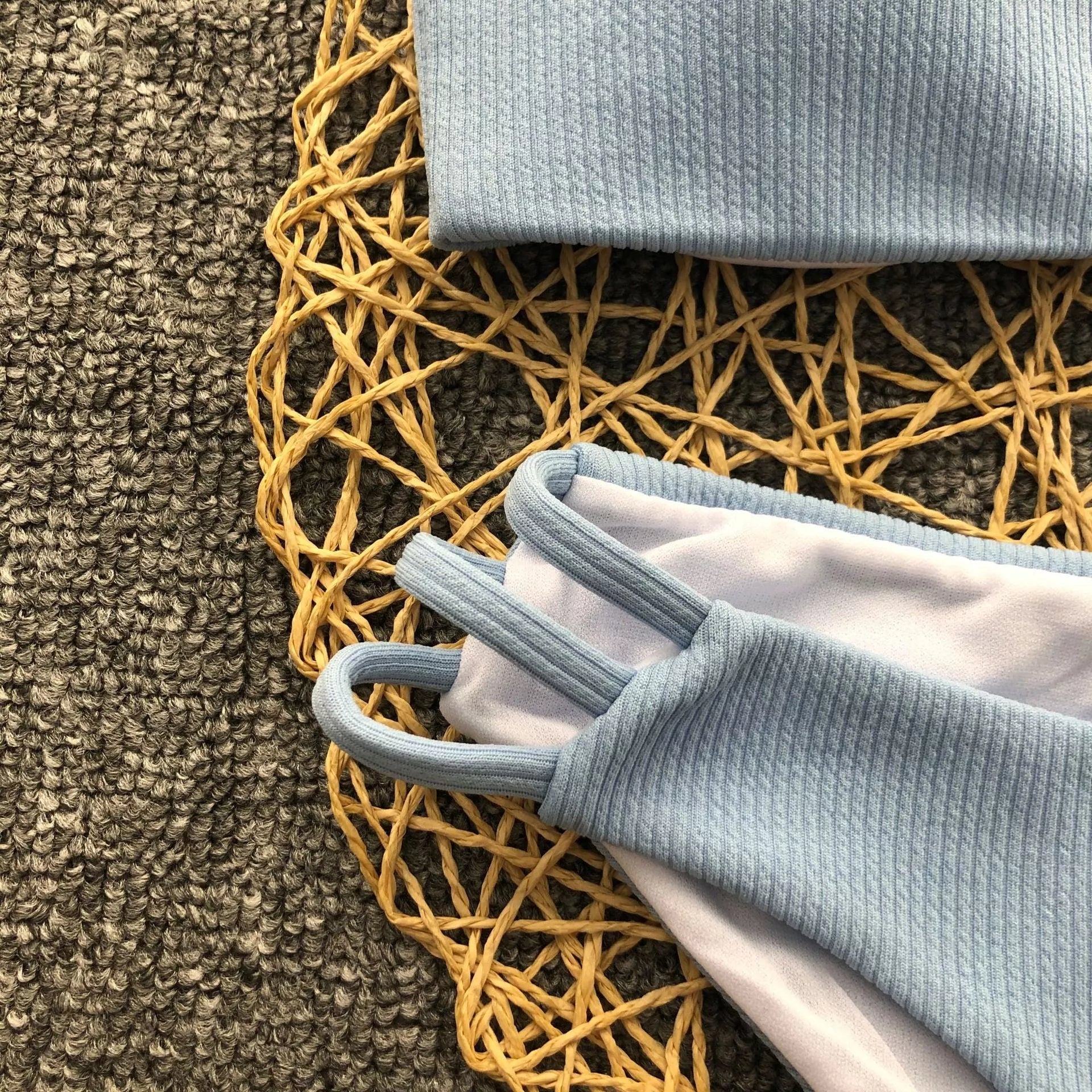 Solid color striped bikini with blue stripes, made of 80% nylon and spandex lining