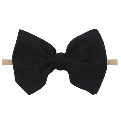 Children's waffle fabric bow hair accessory headband in multiple colour options