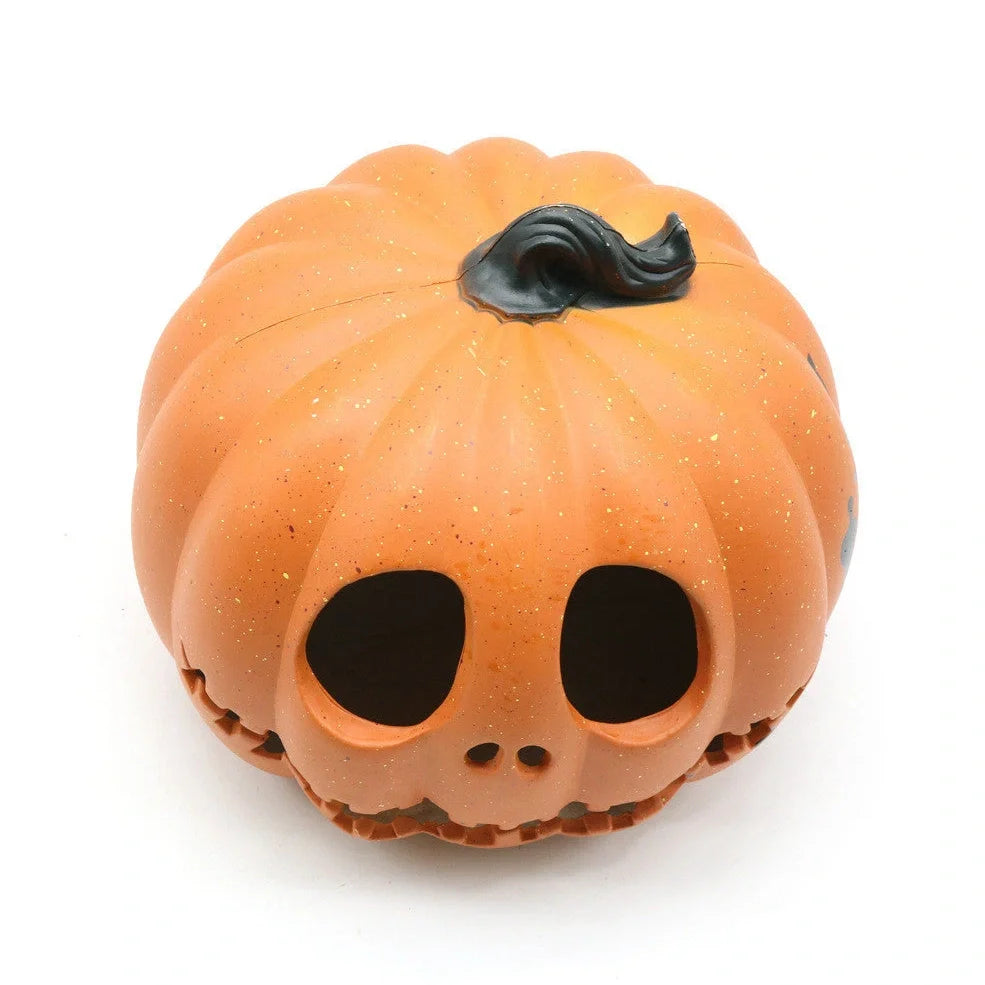 Halloween pumpkin lantern with hollow-out skull design measuring 23 by 19 centimetres