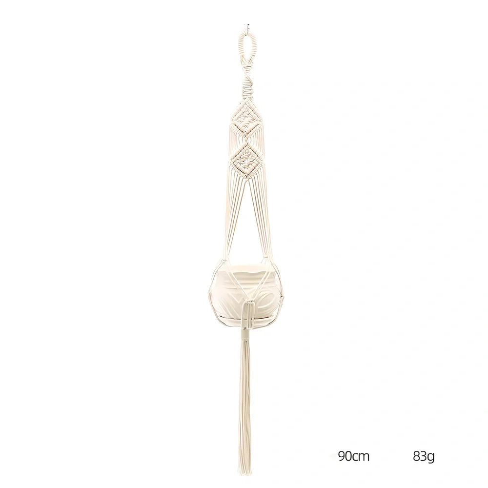 Hand-knitted cotton flowerpot net bag showing mesh pattern and hanging installation