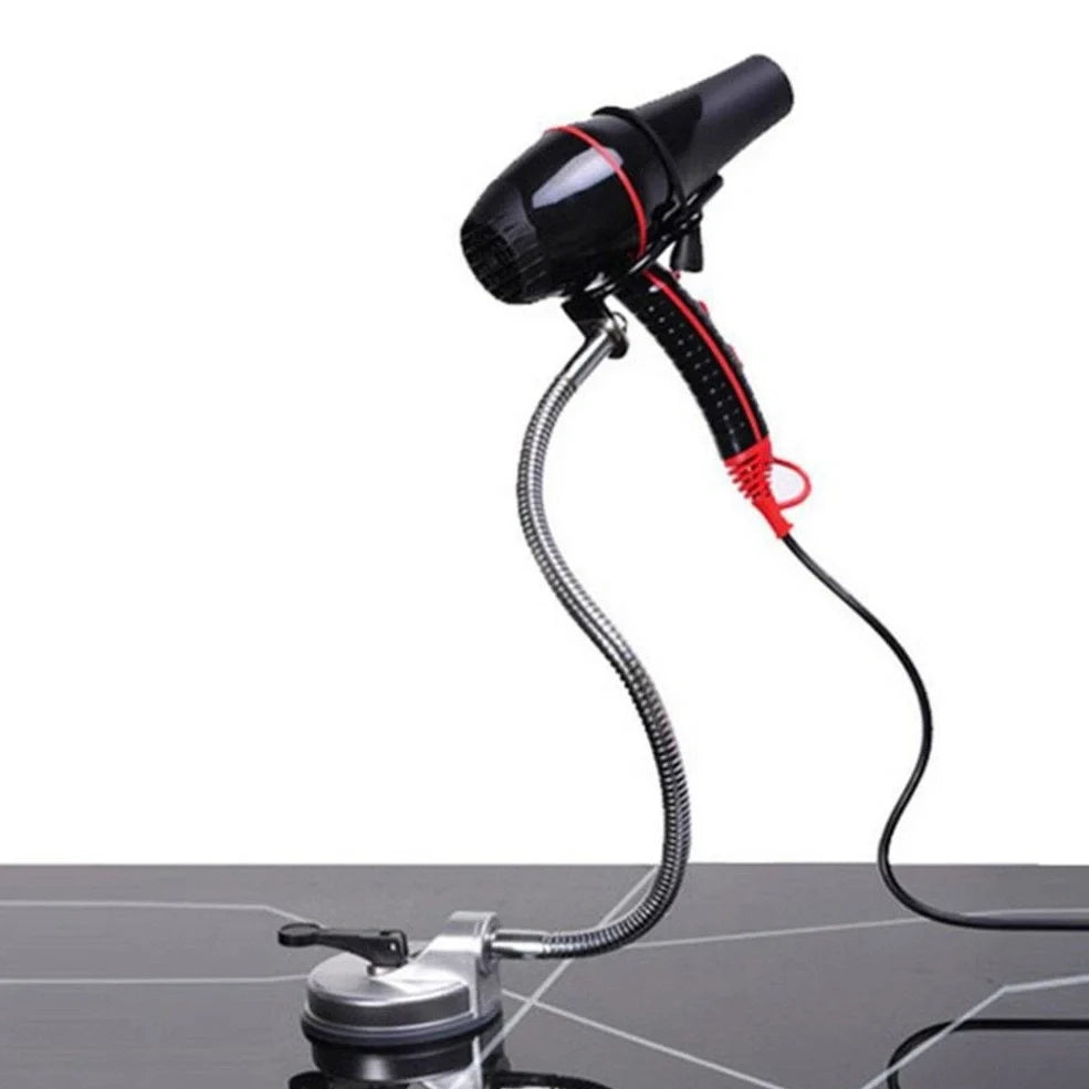 Stainless steel hair dryer holder with suction cup base showing 360-degree rotation capability