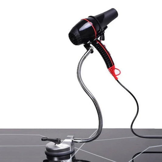 Stainless steel hair dryer holder with suction cup base showing 360-degree rotation capability