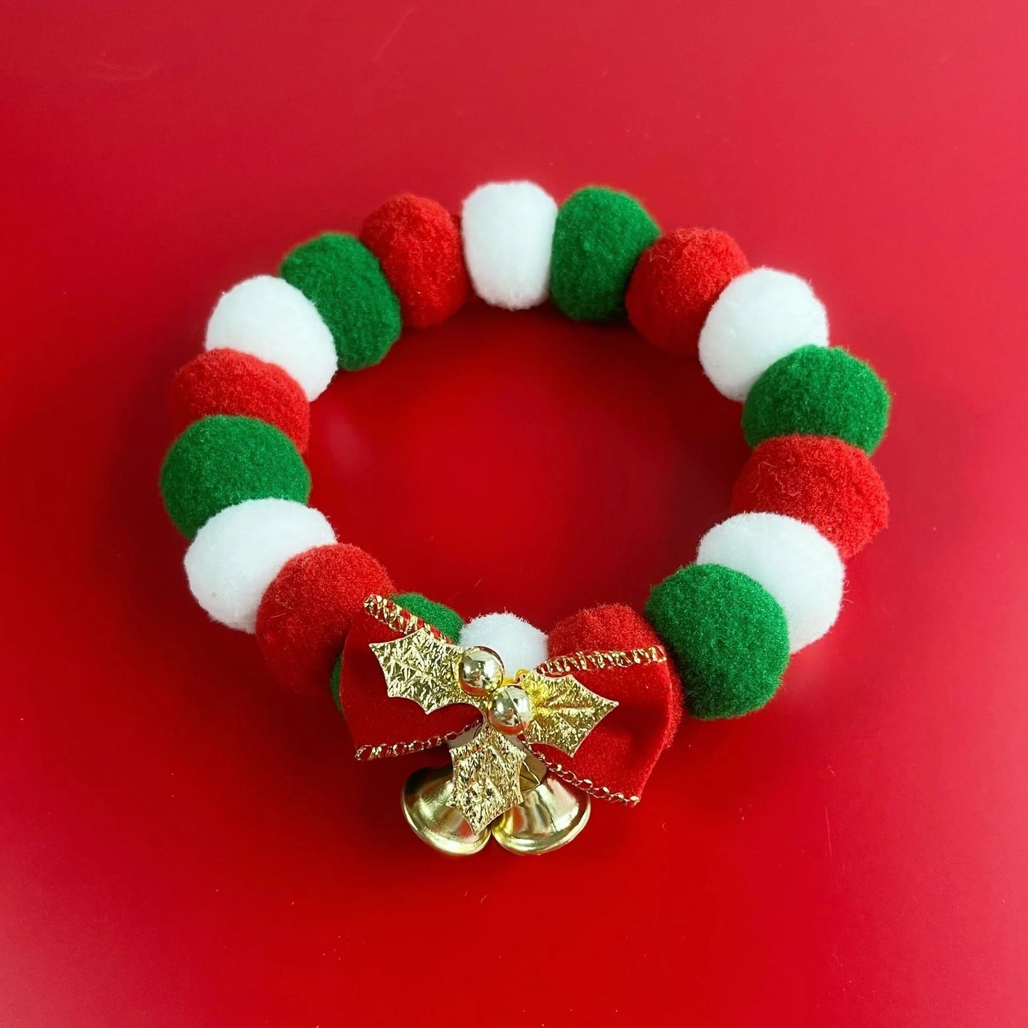 Festive plush pet collar with bow for dogs and cats, perfect for Christmas