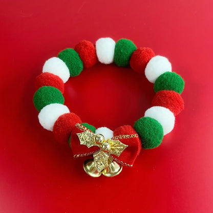 Festive plush pet collar with bow for dogs and cats, perfect for Christmas