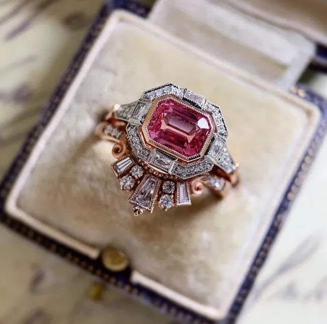 Rose gold geometric women's fashion ring with retro style design shown on finger