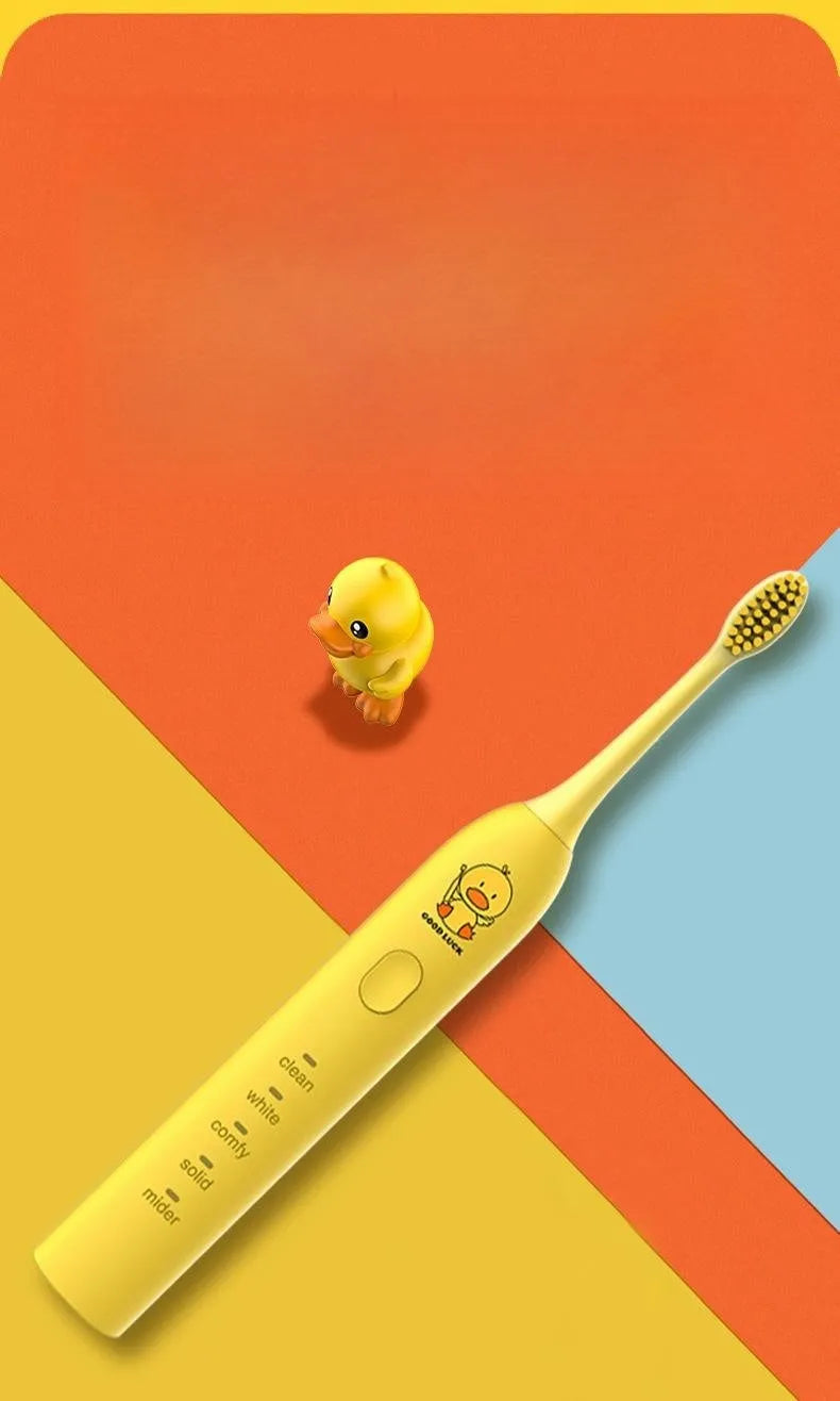 Yellow rechargeable electric toothbrush with small duck design, soft bristles and USB charging cable