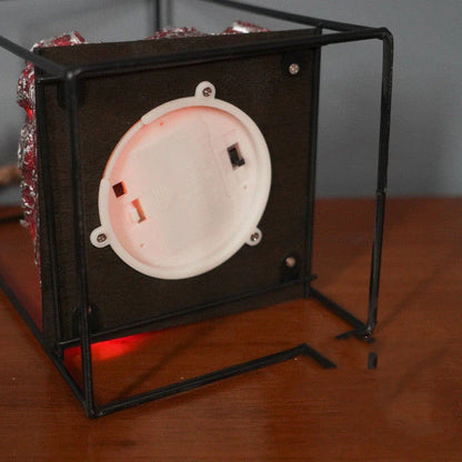 LED Flame Fireplace Lamp with simulated charcoal effect, creating a cozy and inviting ambiance in a living room.