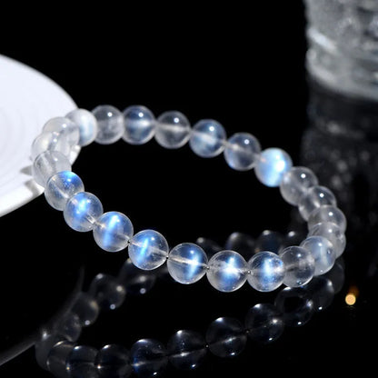 Natural cream body blue moonlight crystal bracelet with grinding texture, unisex design, sizes 4mm to 10mm