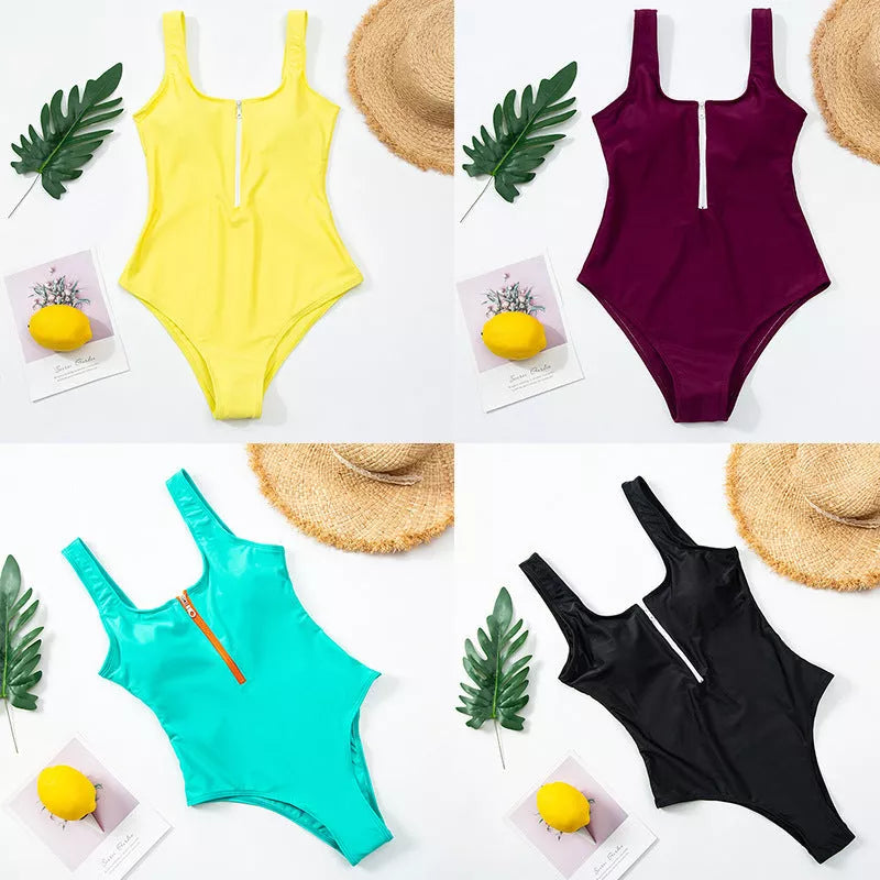 Ladies one-piece swimsuit with front zipper and printed design in various colors