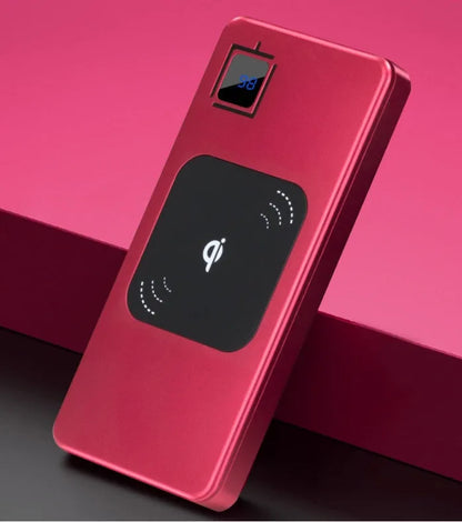Silver alloy portable power bank with LCD screen showing battery percentage, next to a smartphone.