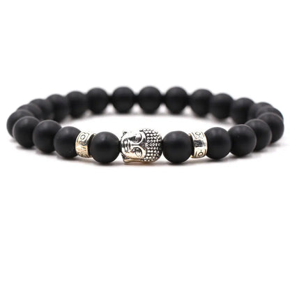 Natural stone stretch bracelet with round beads in various colours including Tigereye and turquoise.