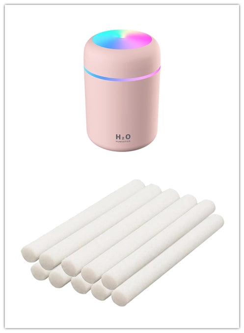 Car USB humidifier with 300ml water tank capacity and 25-35ml/h spray volume for continuous moisture without desktop wetting, featuring colourful atmosphere lights and low noise operation