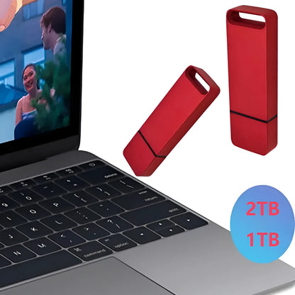 Customisable metal USB flash drive in black, red, or silver, showing high-capacity options for data storage.