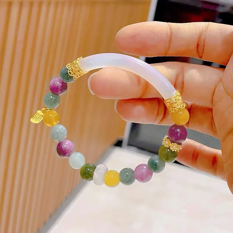 Tourmaline rainbow colour half bracelet with electroplated finish showing natural stone texture and partial wrist coverage design