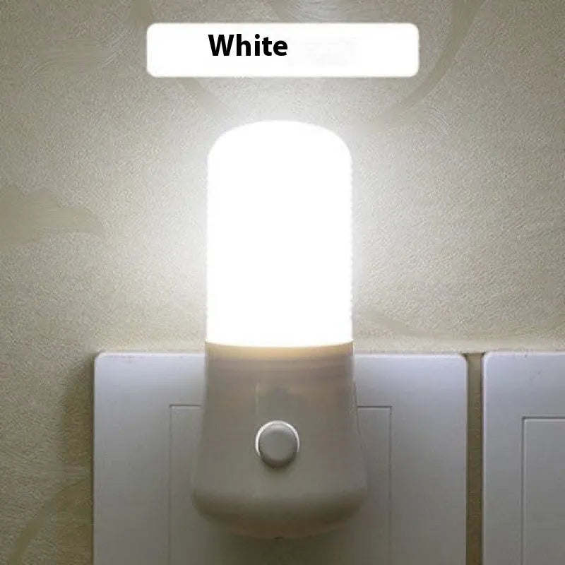 Minimalist plug-in bedside night light with dual colour options and compact square design