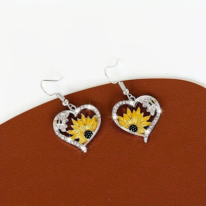 Stylish silver bee sunflower heart earrings for women, perfect for nature lovers.