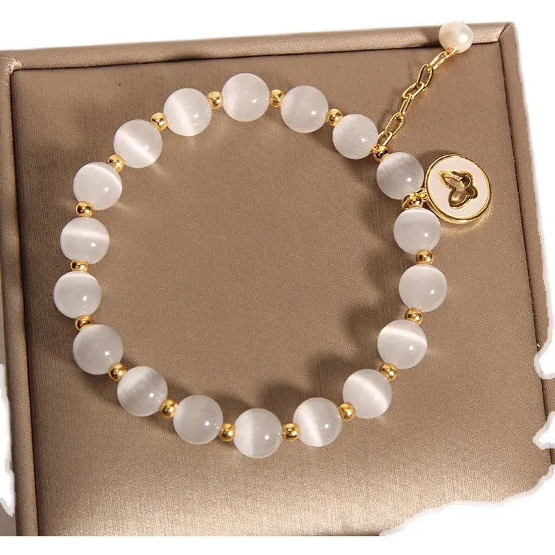 Handmade white cat's eye crystal geometric bracelet for women.