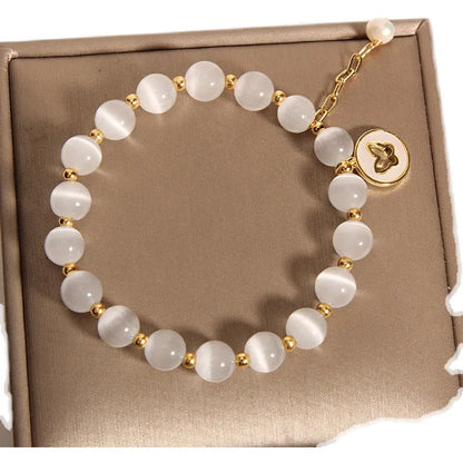 Handmade white cat's eye crystal geometric bracelet for women.