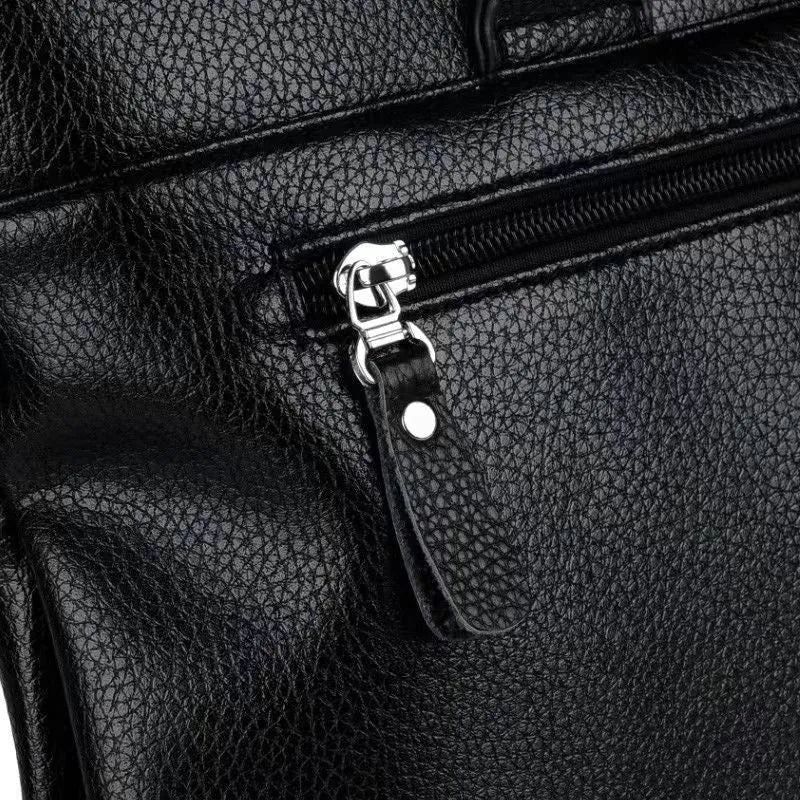 Men's black and brown PU leather shoulder messenger bag with splicing design, shown with crossbody strap.