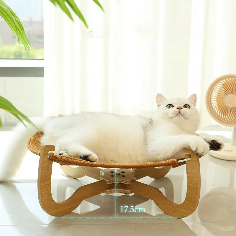 Brown square woven rattan pet hammock bed for cats and small dogs, shown off the ground.
