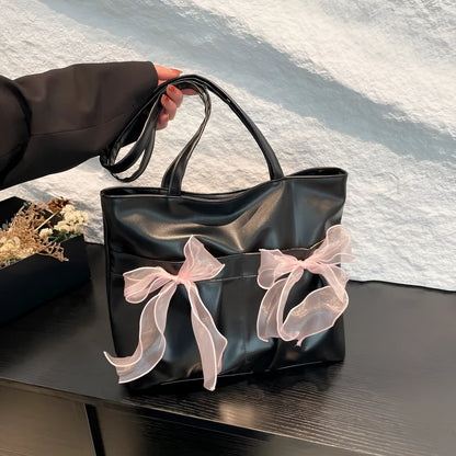 College style bow tote bag with large main compartment and internal zipper organiser in black colour