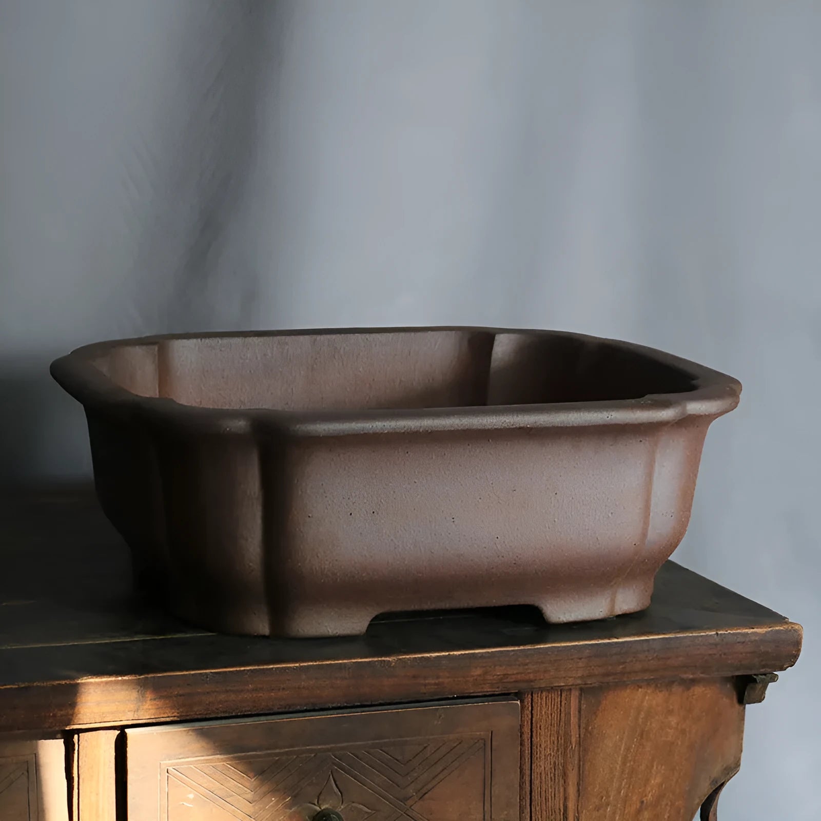 Purple sand rectangular bonsai flower pot measuring 25cm long with natural clay texture