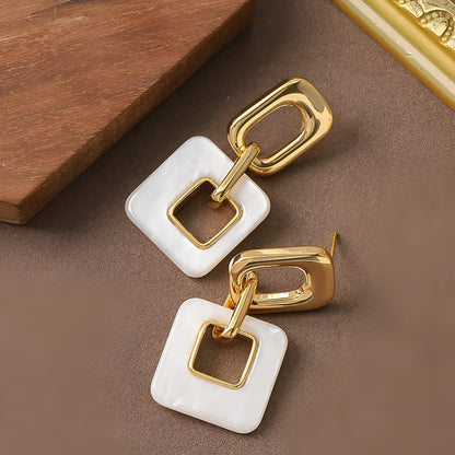Hollow geometric square earrings with chamfered corners and electroplated copper finish